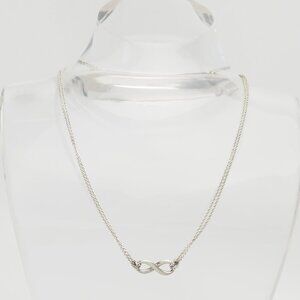 Classic sterling silver double chain Infinity pendant necklace by Tiffany & Co.